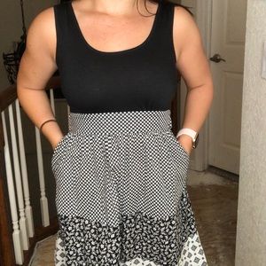 Black dress with pockets and tie on back